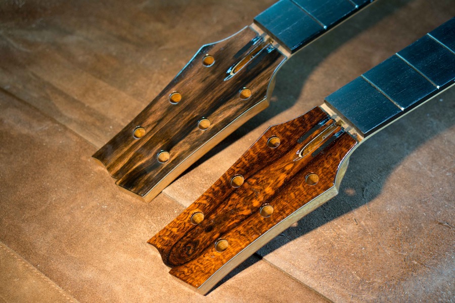 Papua New Guinea Ebony Headsttock on Left, Snakewood on right