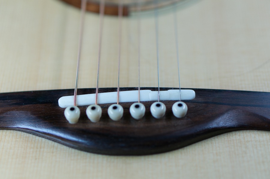 OMvr Guitar Bridge detail.jpg