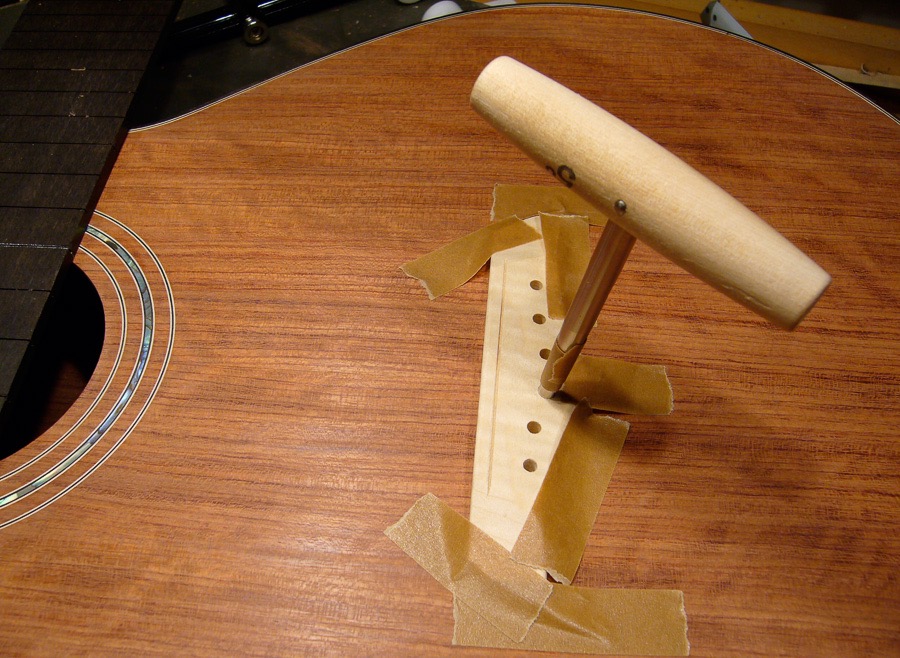 Weissenborn reaming hole for bridge pins.jpg