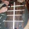 Last scalloped brace being trimmed on back braces.jpg