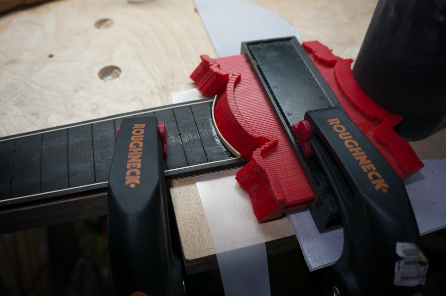 Gluing mitred holly purfling on curve.jpg