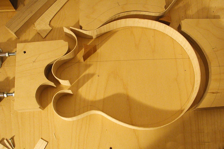 F5 Mandolin bent rim pieces before trimming.jpg